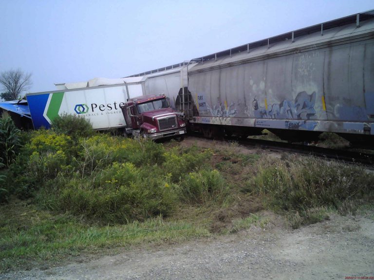 Train Partially Derails After Colliding with Transport Truck near Mitchell