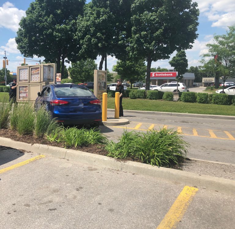 Stratford Police: No injuries after elderly driver strikes Tim Horton’s drive-through sign