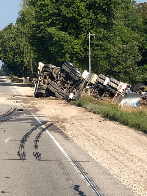 Driver charged after collision that left tractor-trailer in the ditch in Perth County