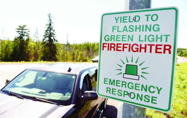 Drivers being reminded to pull over and yield for flashing green lights