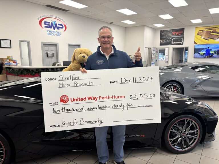 Local car dealerships raise more than $9K for United Way